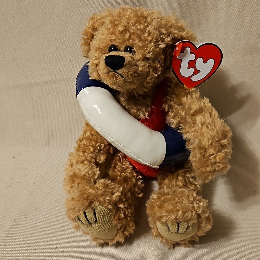 Attic treasure beanie baby, with tag 3rd edition. Allura bear, RARE